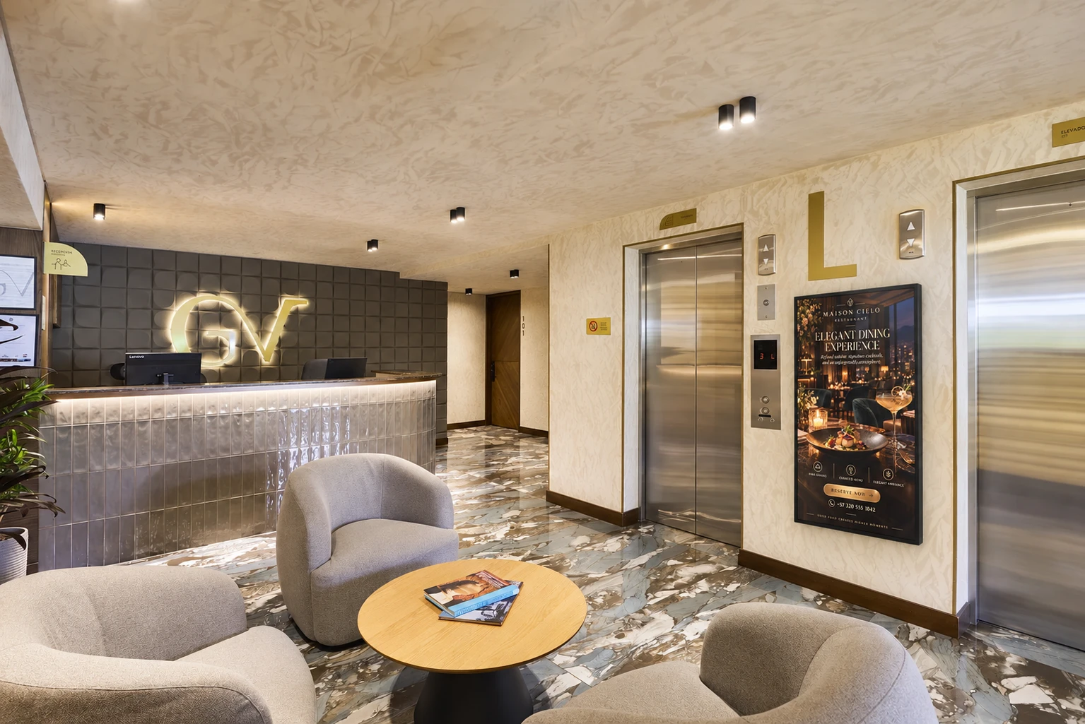 Pantalla con un anuncio de restaurante junto a los ascensores del lobby de Golden Valley, Medellín